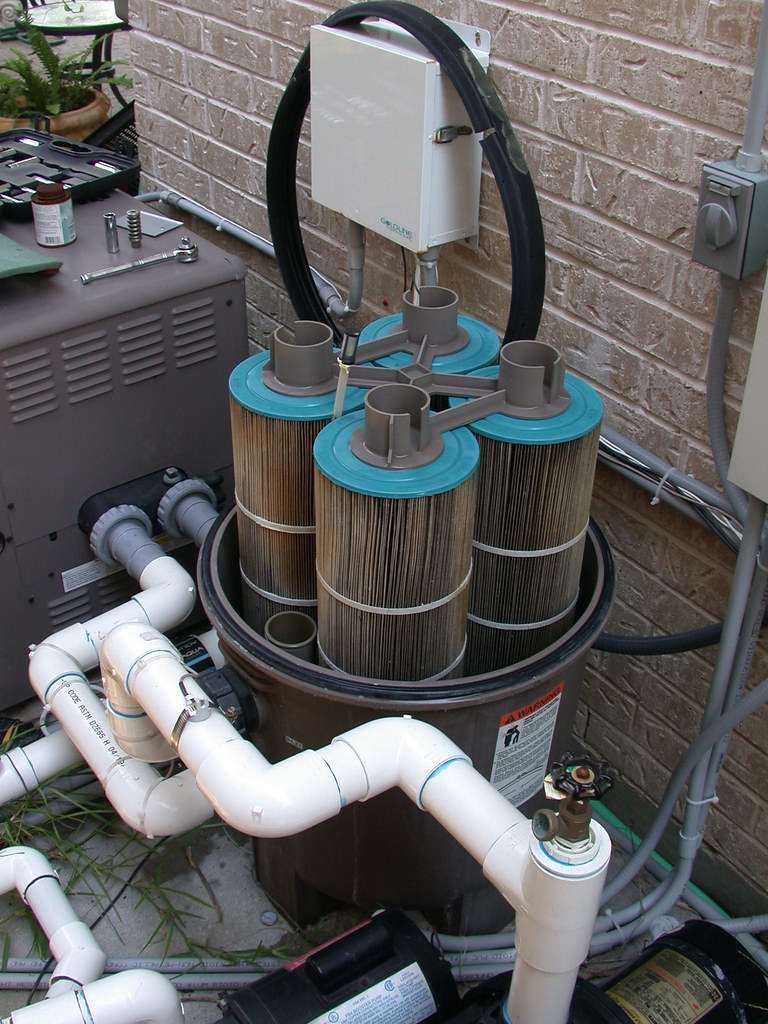 Pool filter cartridge service during equipment maintenance